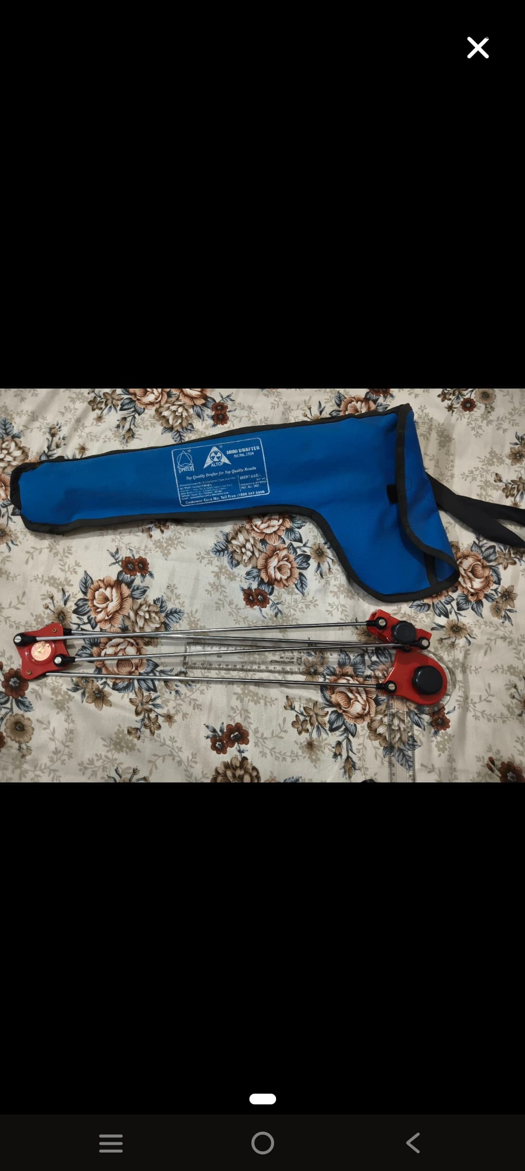Mini drafter with protective cover.